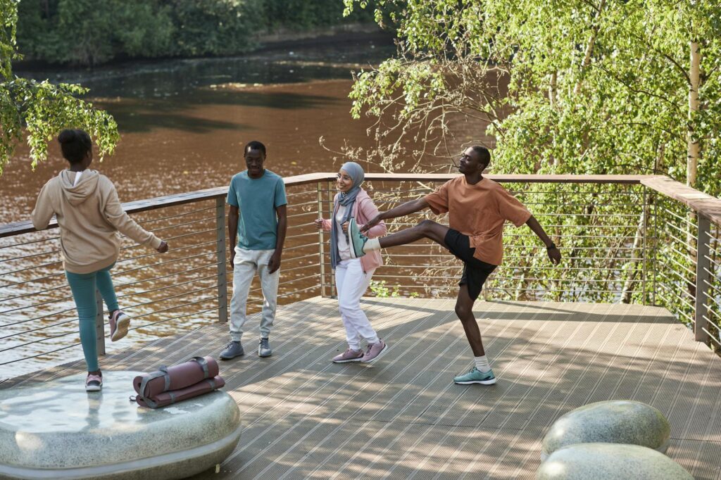 A photo of a diverse group of people engaging in healthy lifestyle activities. — reduce health insurance premiums Nevada