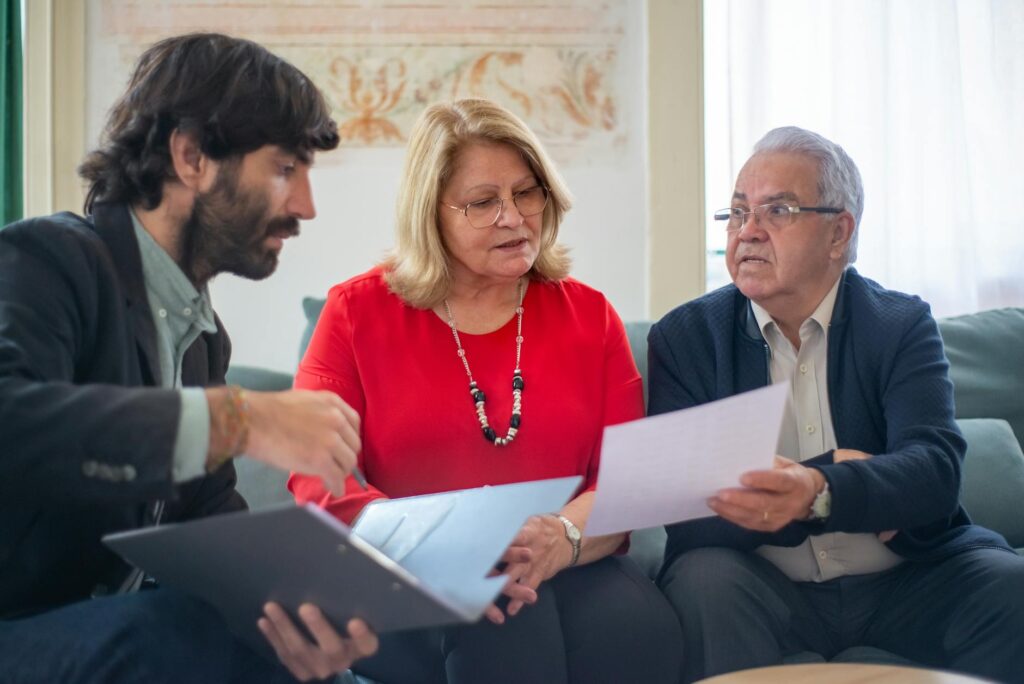 An image showing a family discussing their insurance options at home. — full coverage vs liability insurance Nevada
