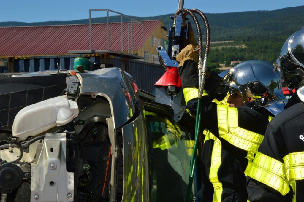 Image of a car accident scene with emergency responders attending. — Nevada car accident insurance guide