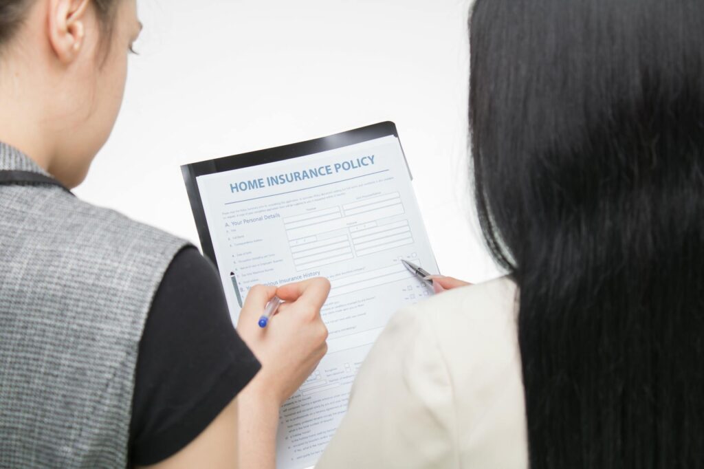 Image of a happy family reviewing their car insurance policy, symbolizing savings from discounts. — car insurance discou…