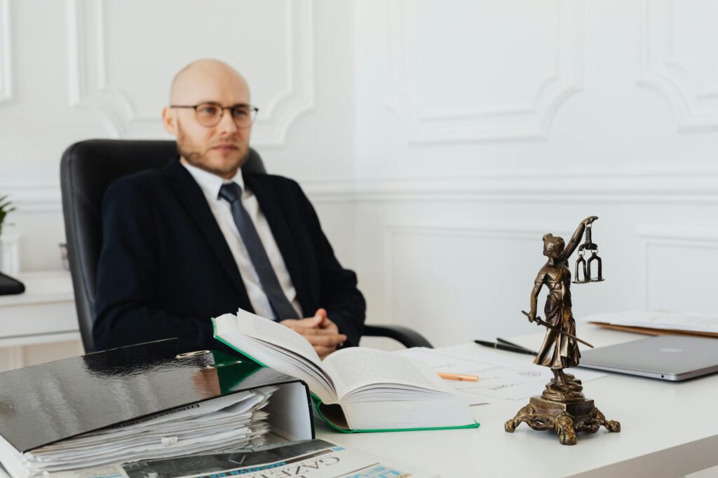 Image of a lawyer consulting with a client about a car accident case. — after car accident Nevada