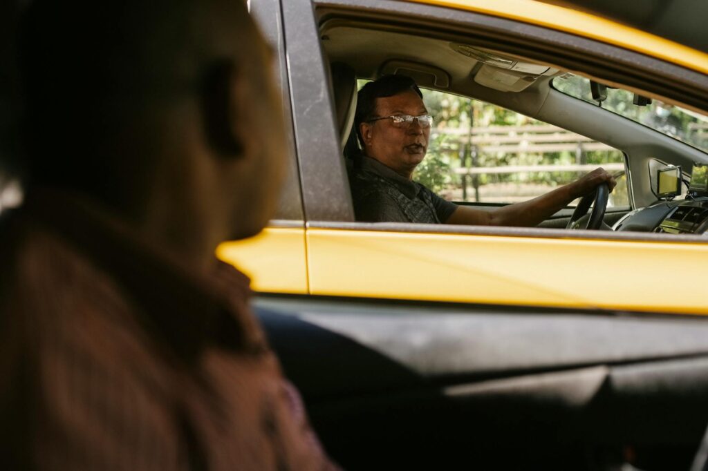 Photo of a driver exchanging information with another driver during the car accident procedure Nevada.