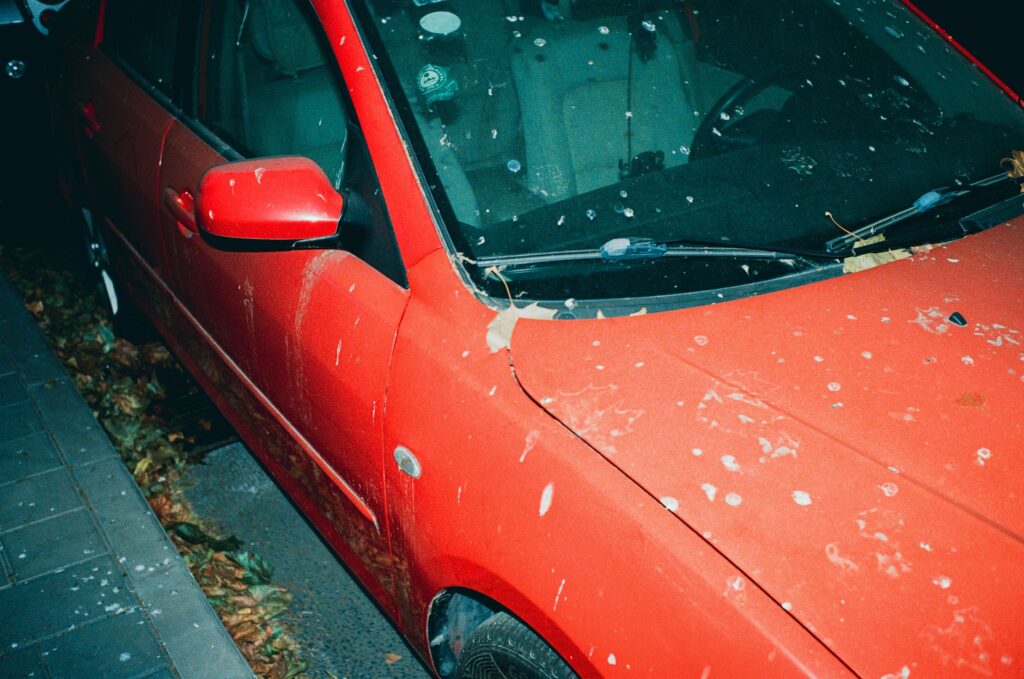 A photo of a car damaged by hail, illustrating the impact of severe weather on vehicles. — Nevada weather car insurance …