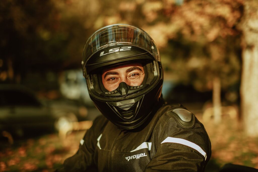 A photo of a motorcycle with a rider wearing protective gear, emphasizing rider protection. — motorcycle insurance nevada