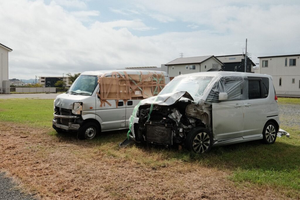An illustration of hail damage on vehicles — comprehensive coverage nevada