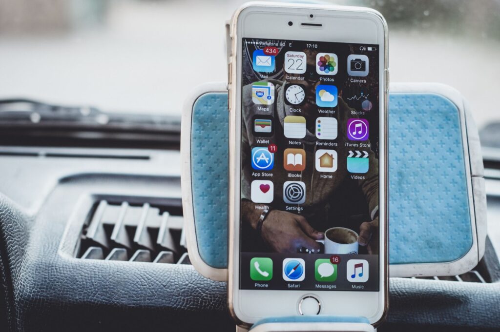 An image of a smartphone with a telematics app displaying driving behavior stats. — car insurance discounts nevada