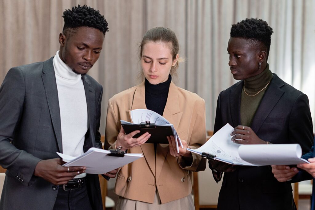 Image of a diverse group of people comparing car insurance quotes online. — credit score car insurance Nevada
