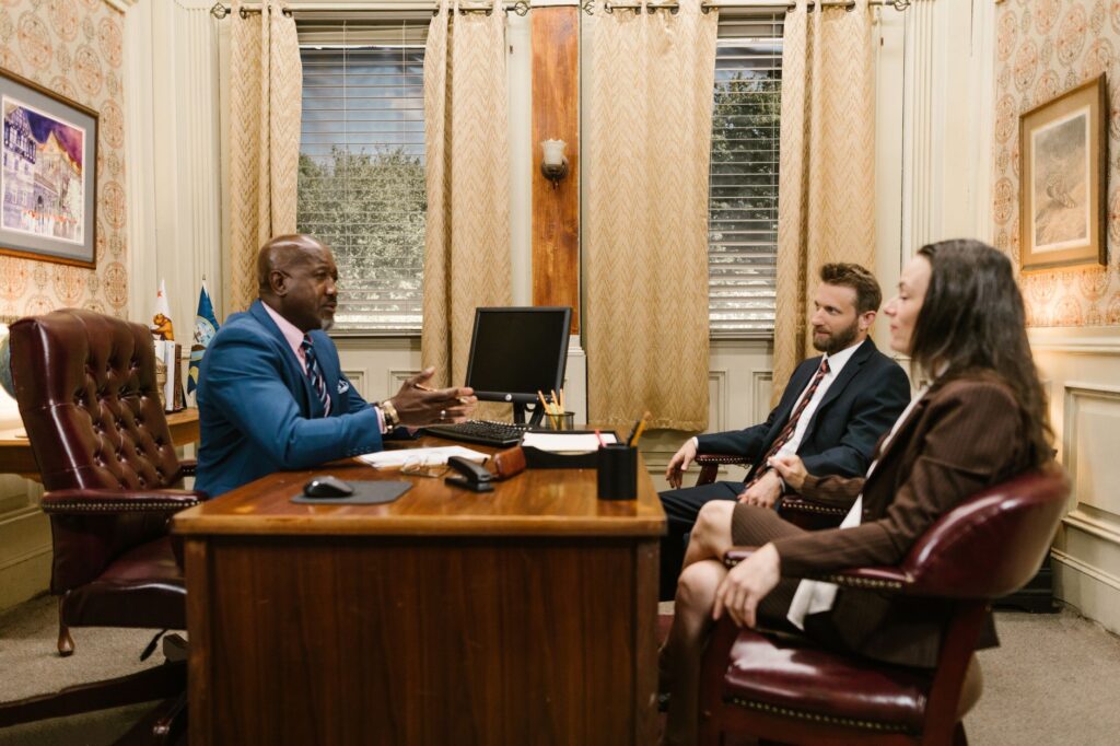Image depicting a meeting between a car accident victim and an attorney. — filing car insurance claim Nevada