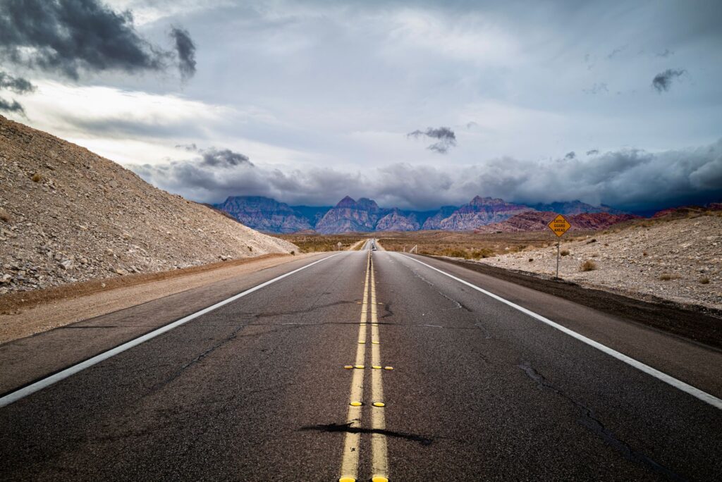 Image of a Nevada highway sign with the words 'Minimum Coverage Required' — Nevada car insurance requirements