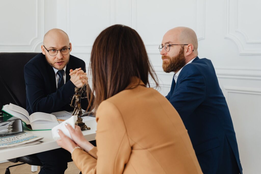 Image showing a lawyer consulting with a client about accident claims — car accident steps Nevada