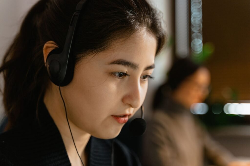 A customer service representative assisting a client with insurance questions. — Nevada car insurance providers