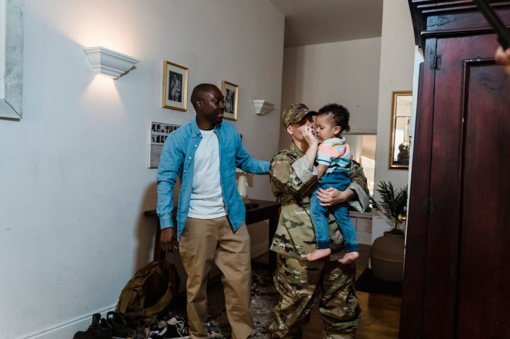 A military family discussing insurance options, representing military discounts. — Nevada car insurance discounts