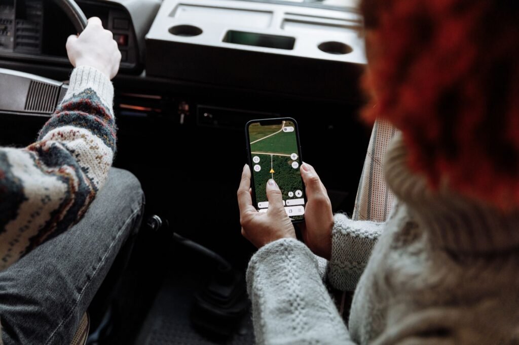 An image of a driver using a smartphone app to monitor their driving behavior. — usage-based car insurance Nevada