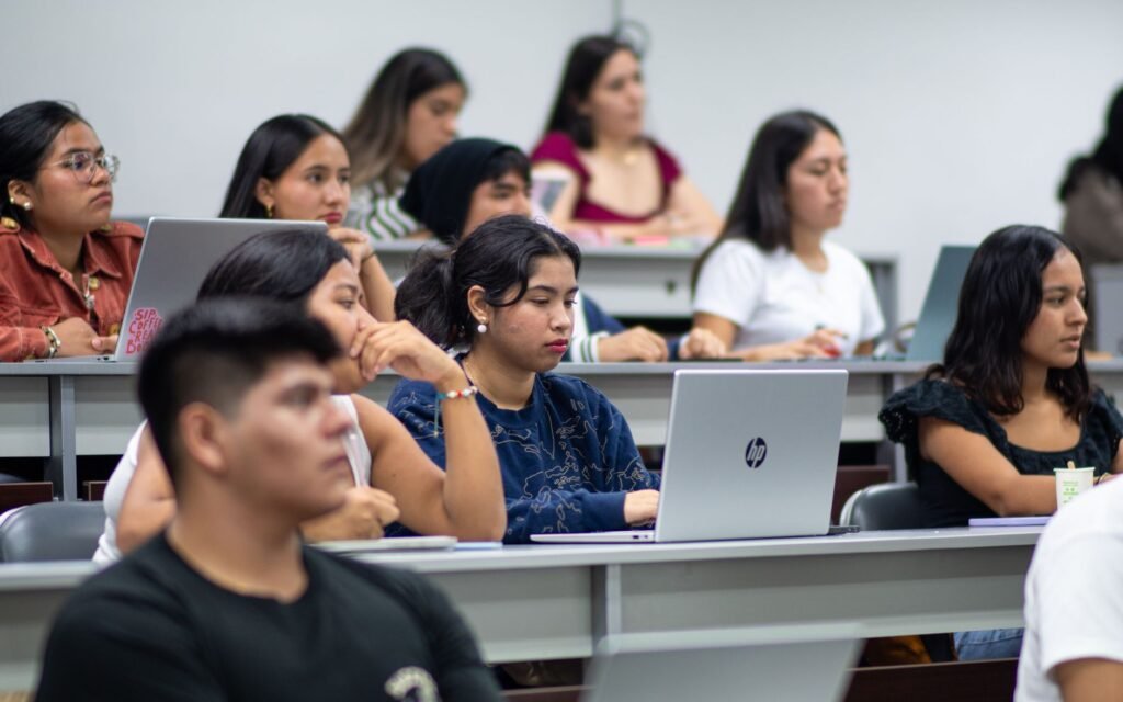 An image of a student studying with a laptop, symbolizing the good student discount — car insurance discounts Nevada