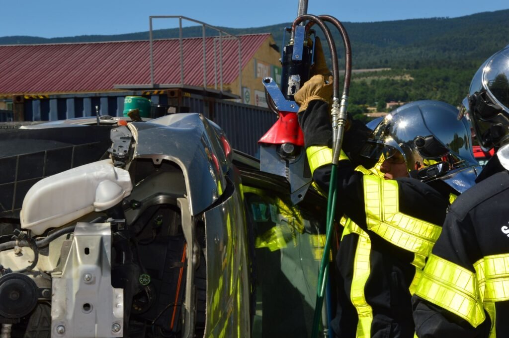 Image of a car accident scene with emergency responders present, showcasing the importance of safety. — after car accide…