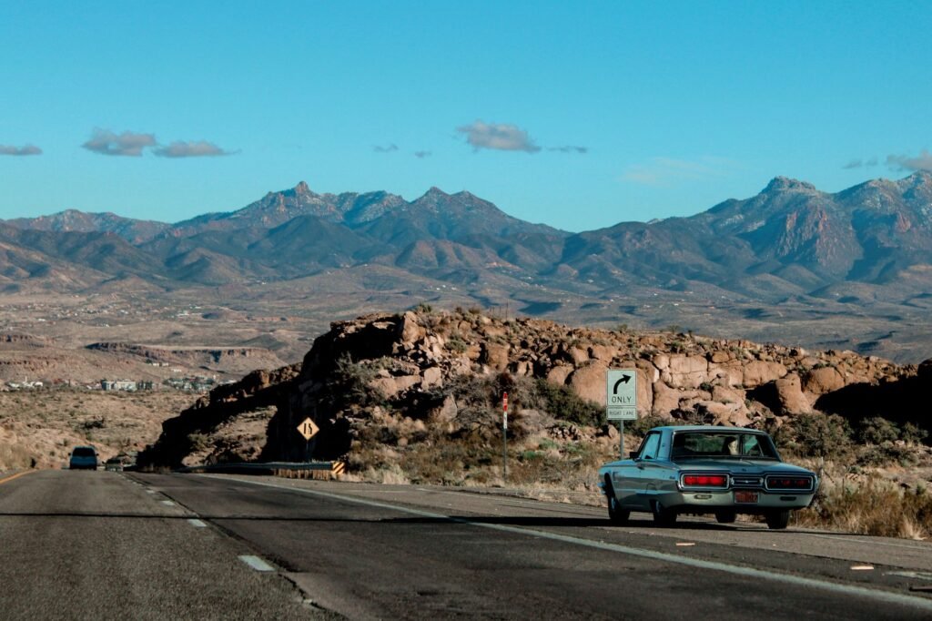 Image of a scenic Nevada landscape with a car, symbolizing safe driving in the state. — affordable car insurance Nevada