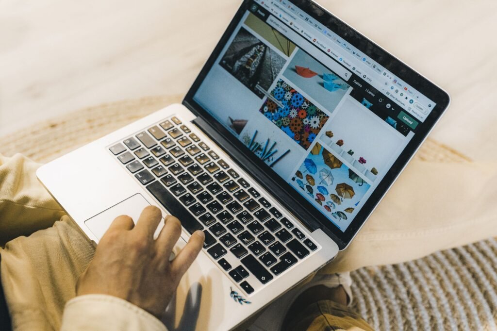 Photo of a person using a laptop to compare insurance quotes online — save money car insurance Nevada
