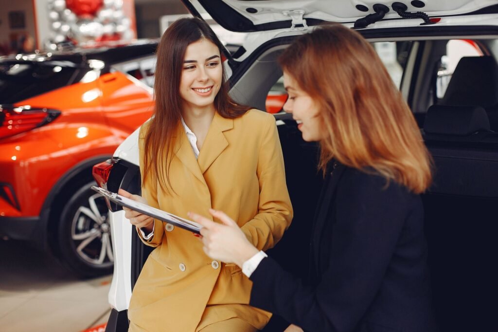 A photo of a satisfied customer receiving help from a car insurance agent. — best car insurance Nevada 2026