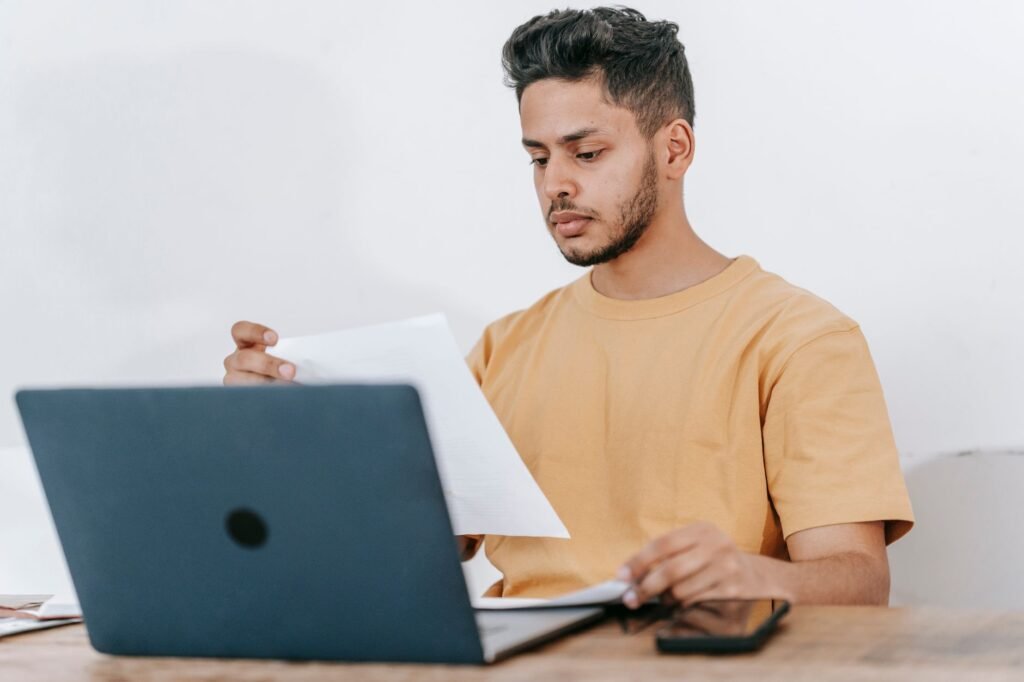 A photo of a young driver reviewing insurance options online — car insurance for young drivers Nevada
