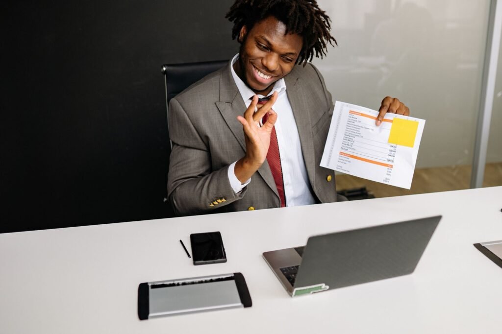 An image of a happy customer reviewing their Nevada car insurance policy online — best car insurance in Nevada