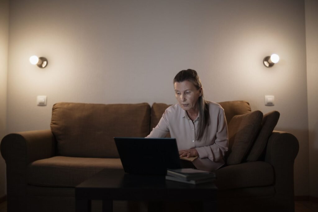 An image of a person using a computer to compare car insurance quotes online. — best car insurance Nevada