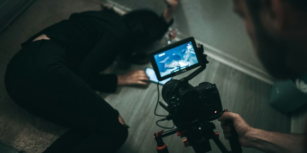 Image showing a person documenting an accident scene with a camera. — car accident insurance Nevada