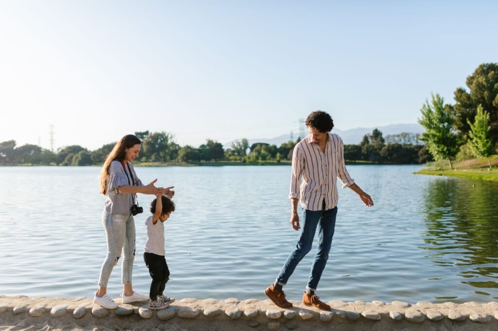 A happy family enjoying peace of mind with their bundled insurance — bundling car and home insurance Nevada