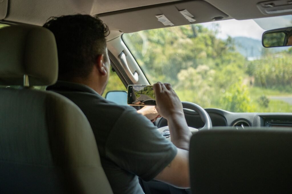 A photo of a driver taking a defensive driving course, showcasing ways to save on car insurance Nevada.