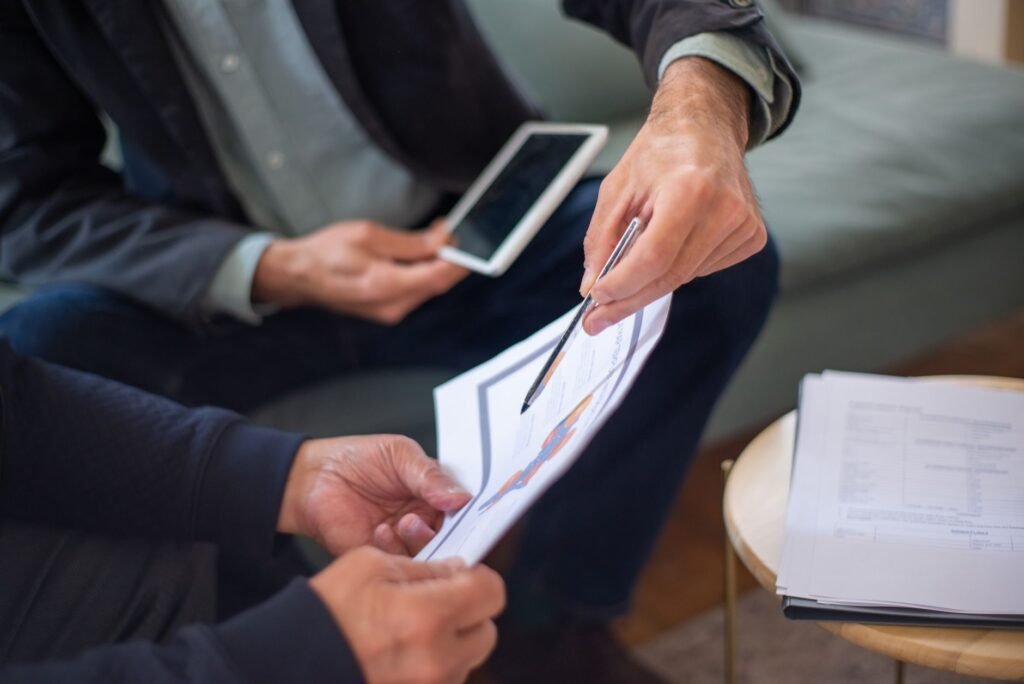 Image of a professional discussing insurance options with a client. — after car accident Nevada insurance